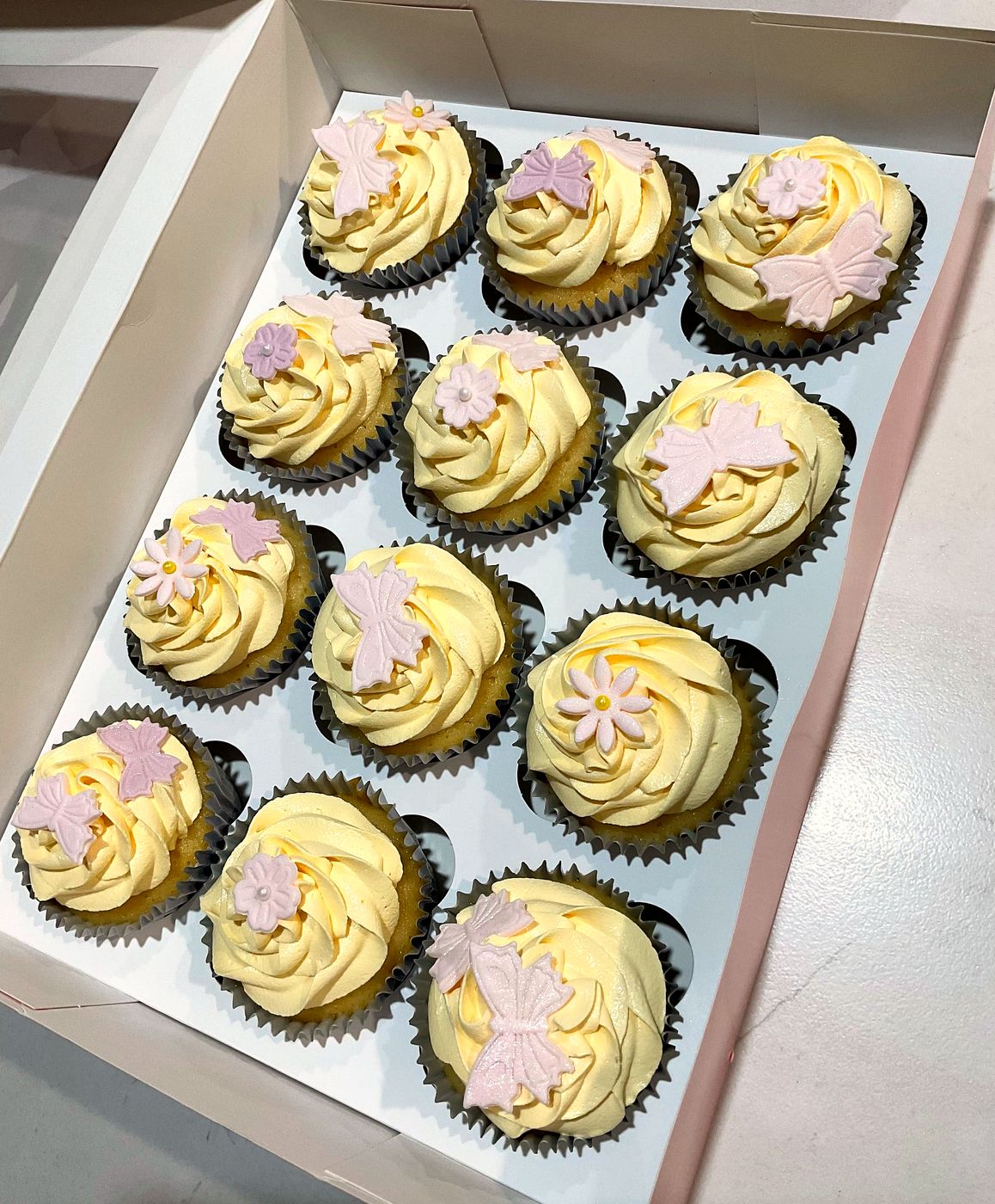 Yellow flower cupcakes by Chanelle
